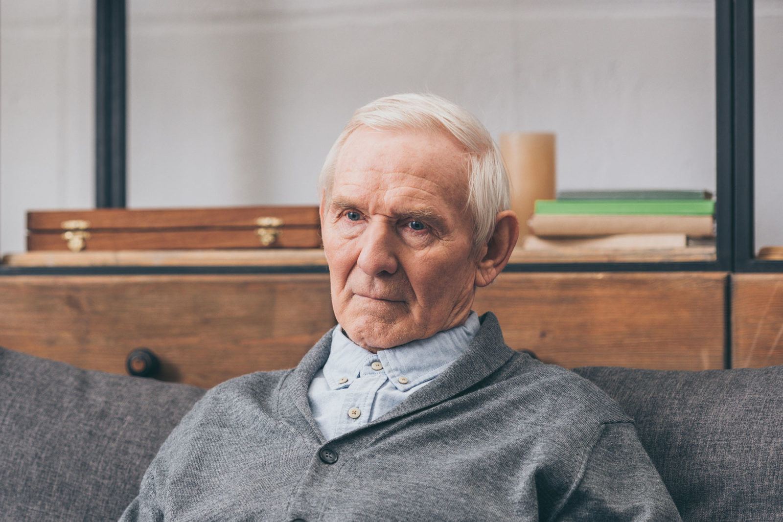 Senior man sitting on a couch