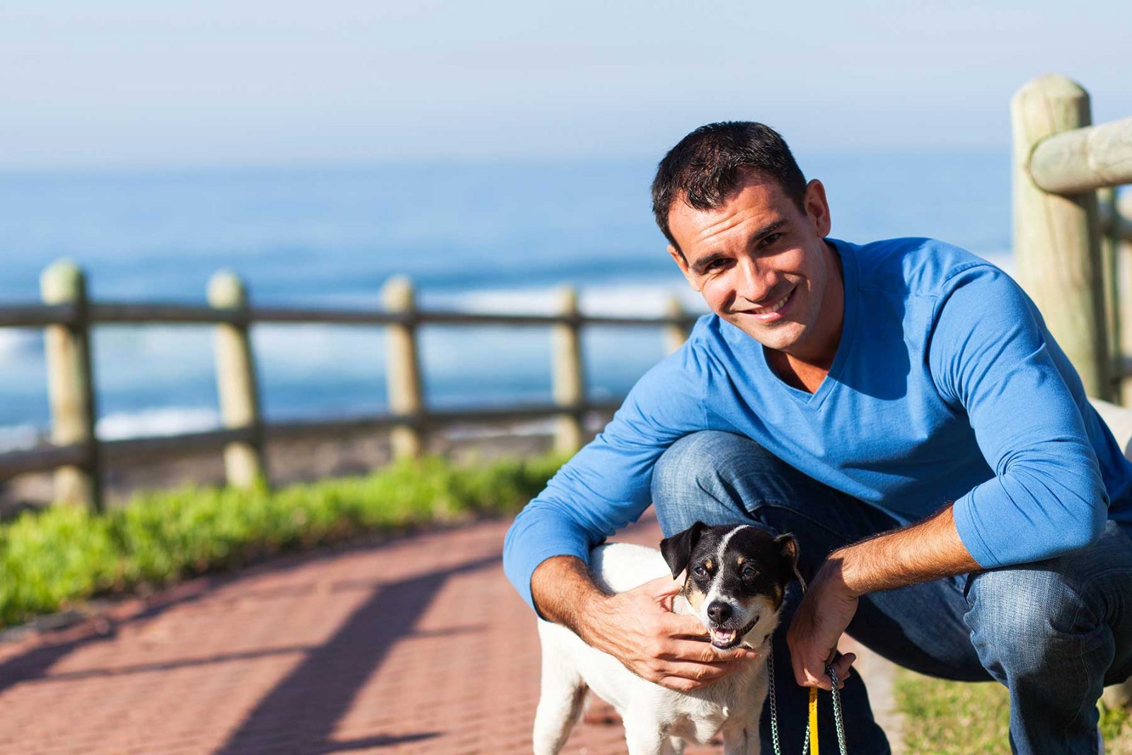 Man taking a mental health day walking his dog