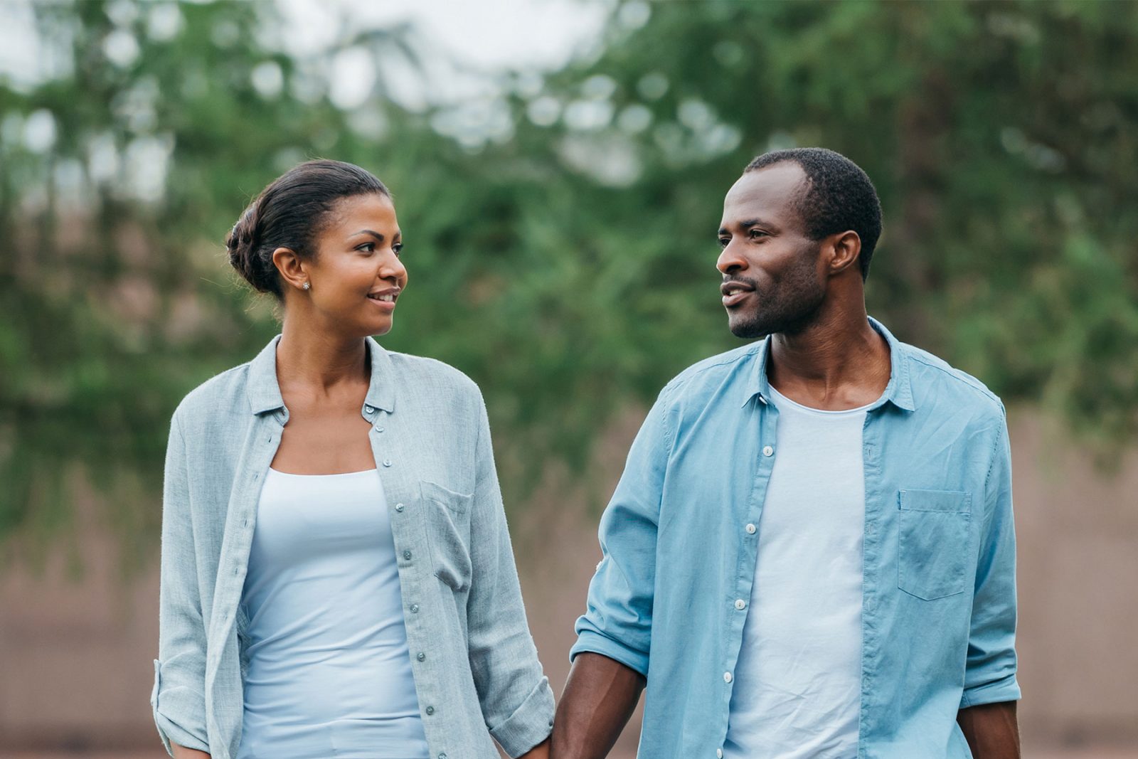 Couple walking together hand in hand