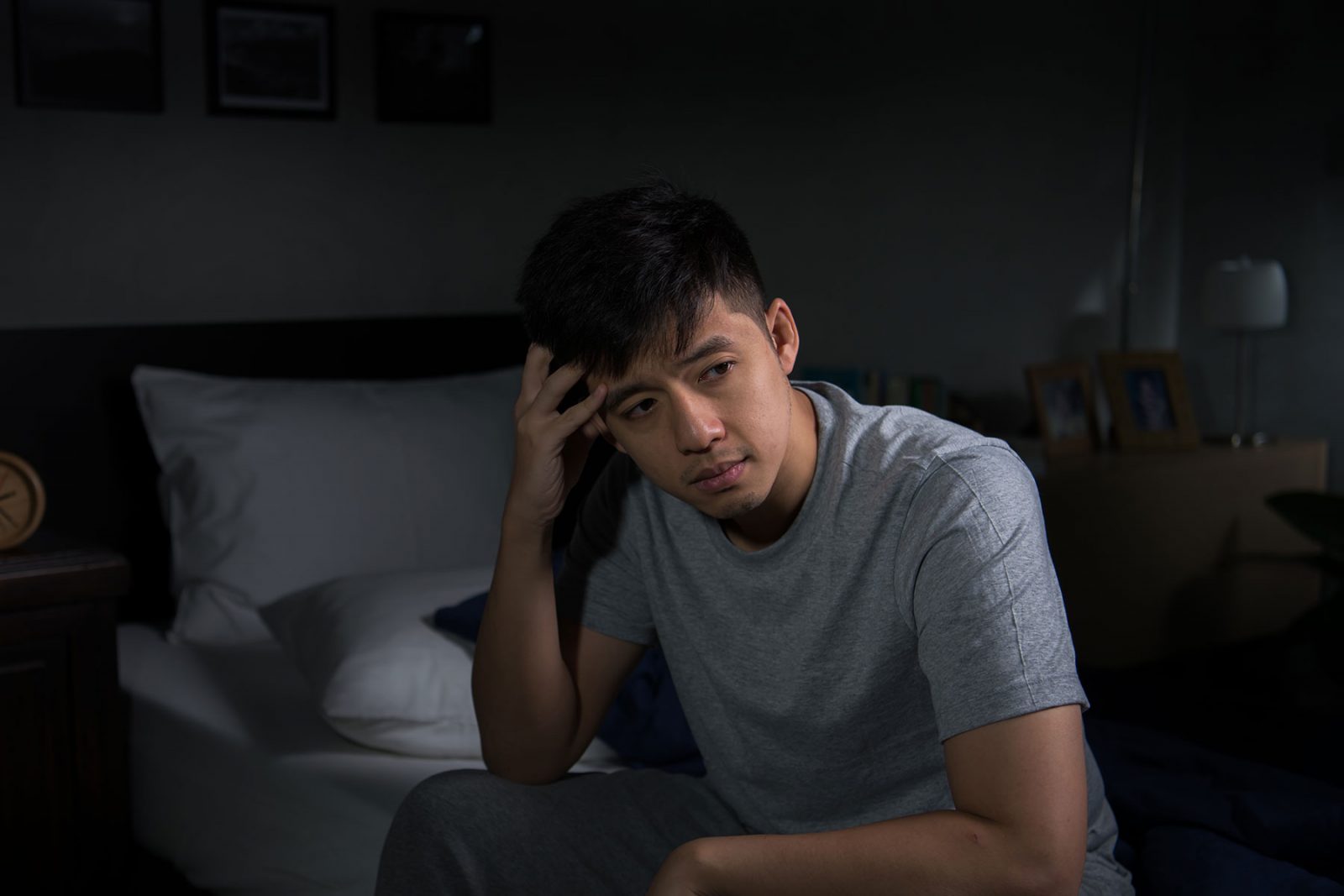 Depressed man stuck in a negative thinking loop
